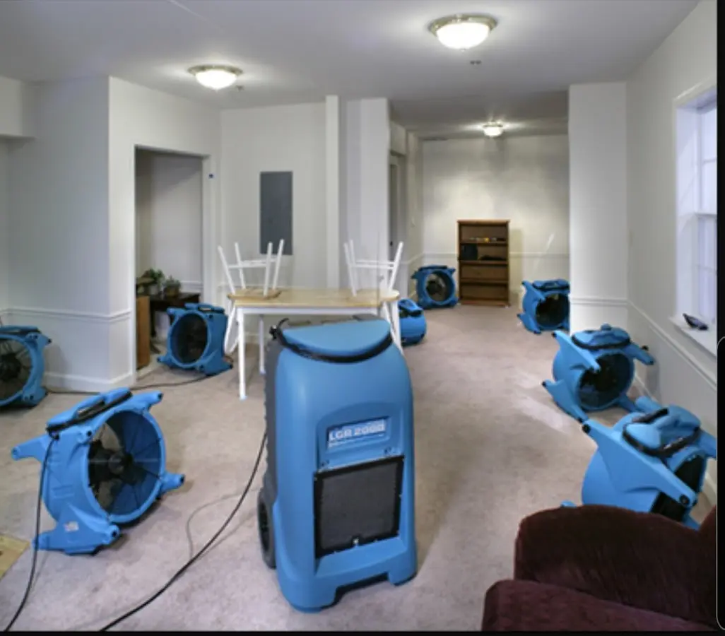 Air movers and dehumidifier setup for Water Damage Restoration in Home Gardens